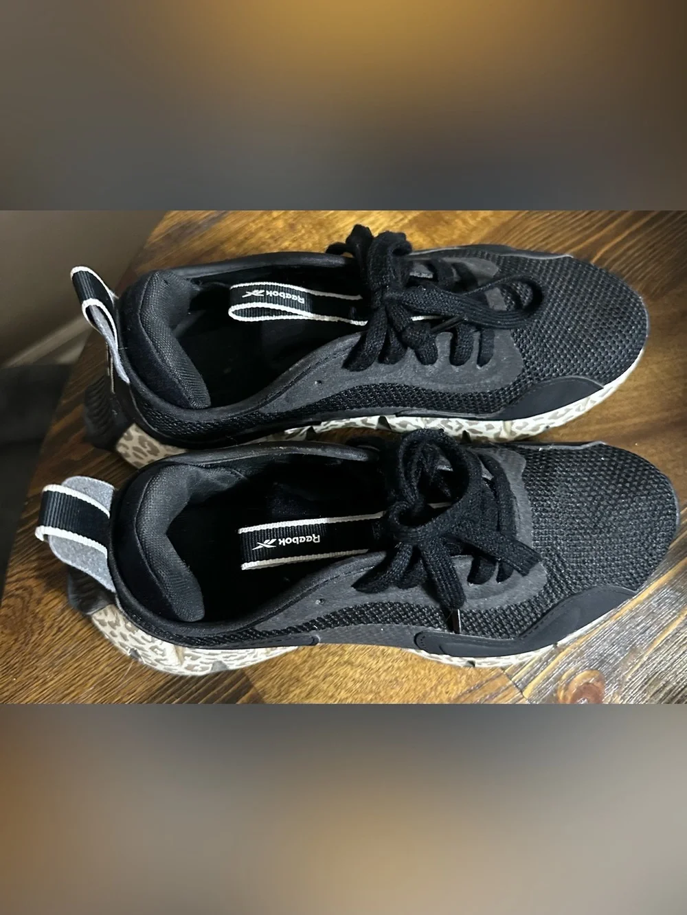 Reebok Black Athletic Sneakers with Leopard-Print Sole